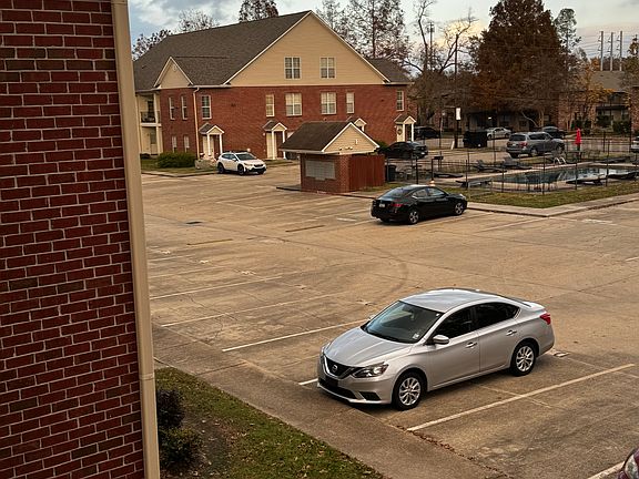 View of Pool and Parking from Balcony