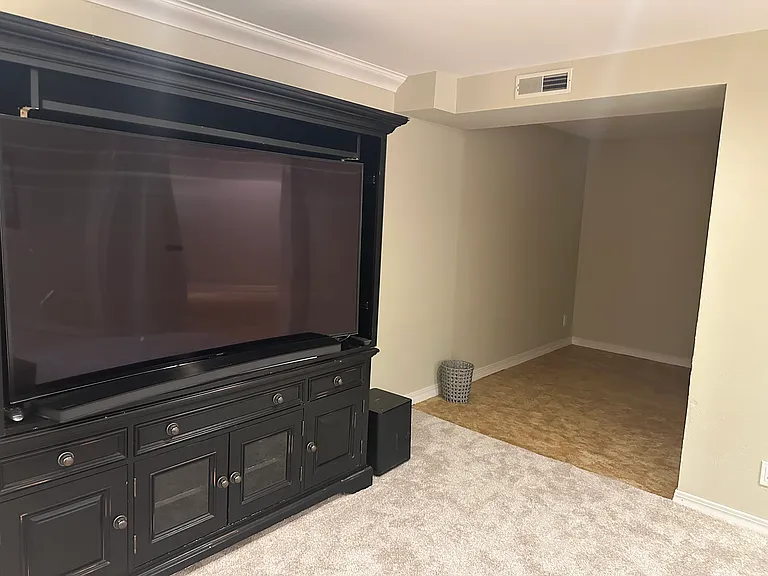 65" HD smart TV must remain. more storage at right