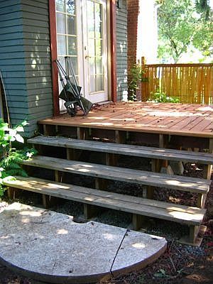 deck with stone landing