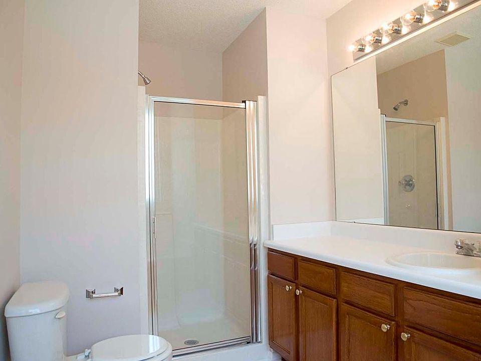 Standing shower in master. Bathtub to the right.