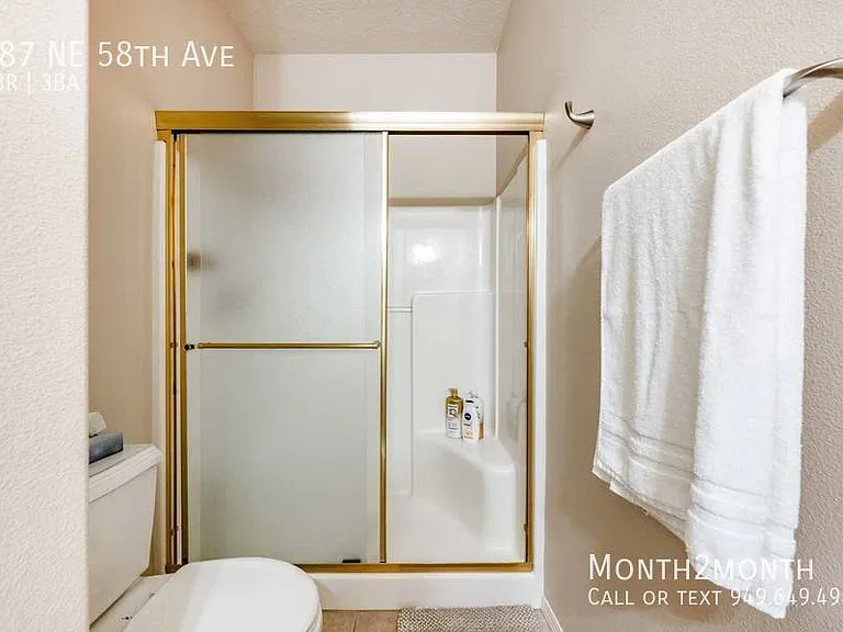 487 NE 58th Ave — Photo 21