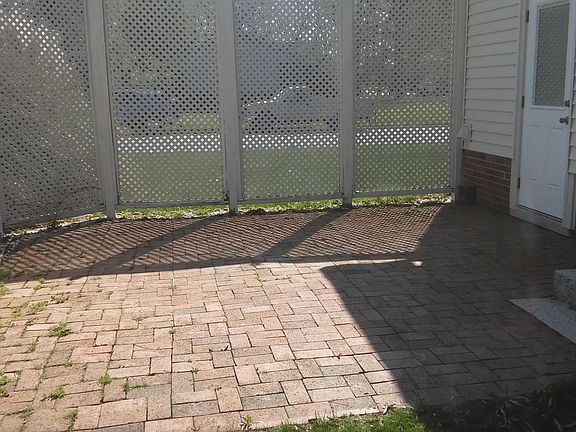 Brick patio with storage shed. Great for grilling and entertaining friends and family.