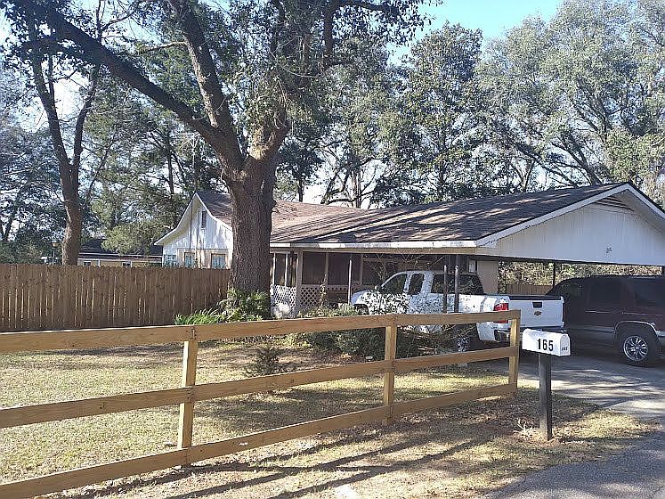Front view with new fence