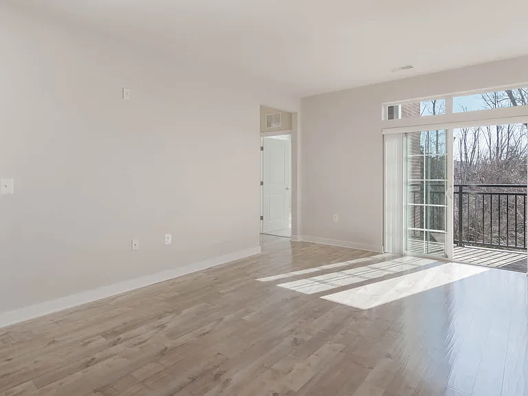 Living Room with Balcony and Hard Surface Flooring