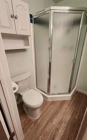 Restroom 1 with walk-in shower.