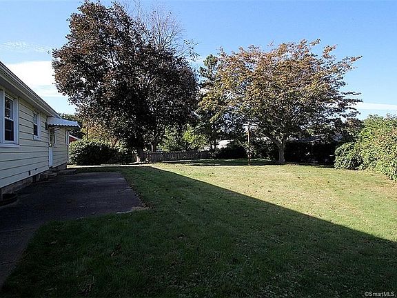 View of the back yard from the side.