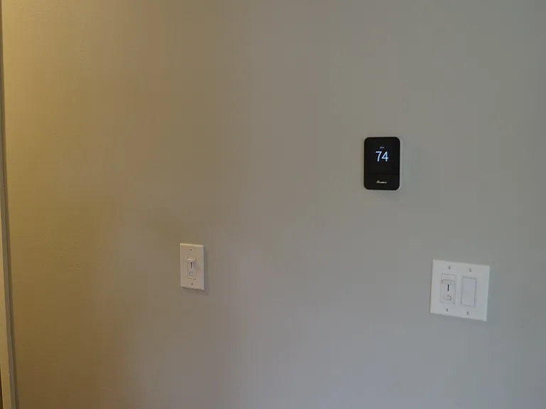 Smart thermostat for a new Amana energy efficient heat pump furnace and air conditioning system.
