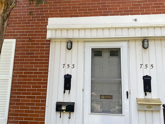 Duplex: front door splits into two separate doors
