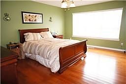 Master Bedroom on Main Floor with Hardwood Floors