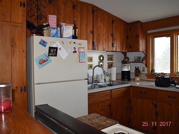 Kitchen has been upgraded to granite counters and SS appliances since this photo was taken
