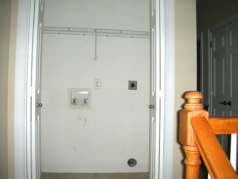 Washer and Dryer Closet. We will provide a set of stackable washer/dryer set.