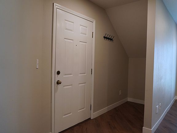 Convenient extra storage space added right by the front door, perfect for keeping your home organized.