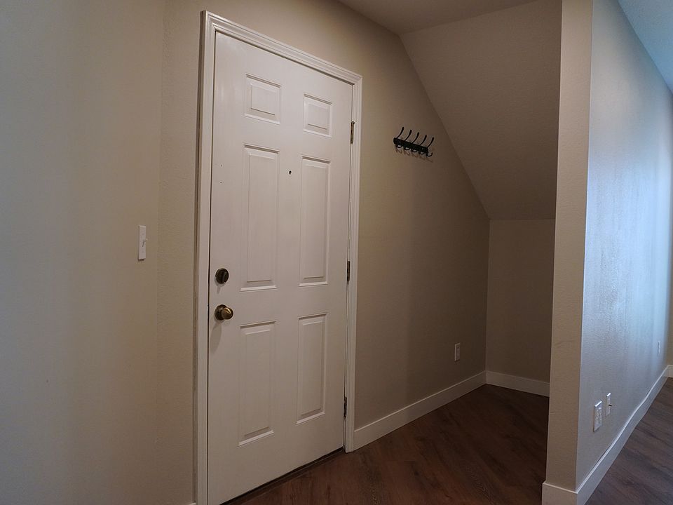 Convenient extra storage space added right by the front door, perfect for keeping your home organized.