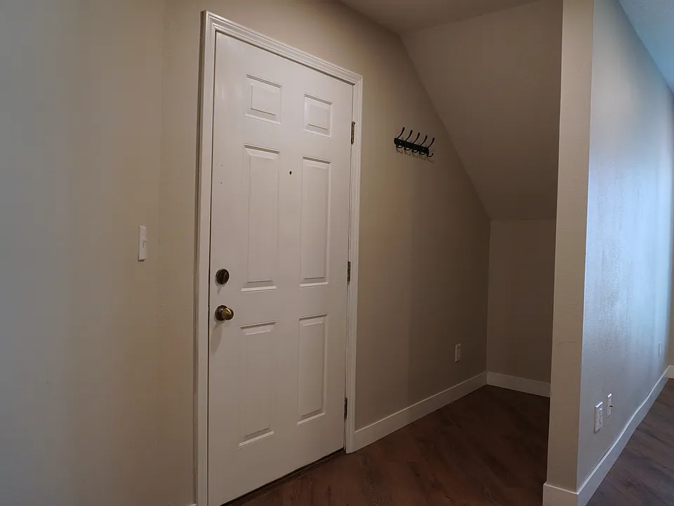Convenient extra storage space added right by the front door, perfect for keeping your home organized.