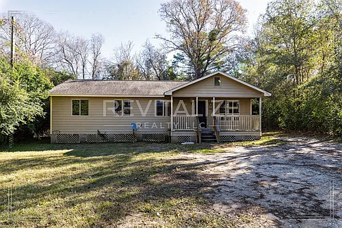 1746 Cody Rd N Photo 1