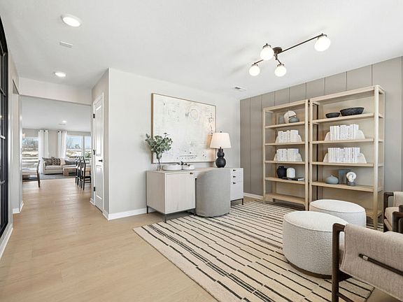 The beautiful foyer, flex room, and beyond as you step into the front door.