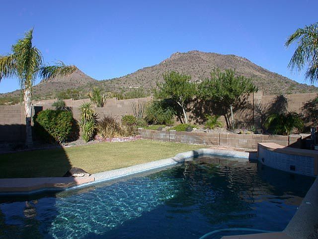 Resort-like back yard backs up to mountain preserve