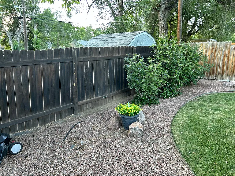 Fully fenced backyard 1/3