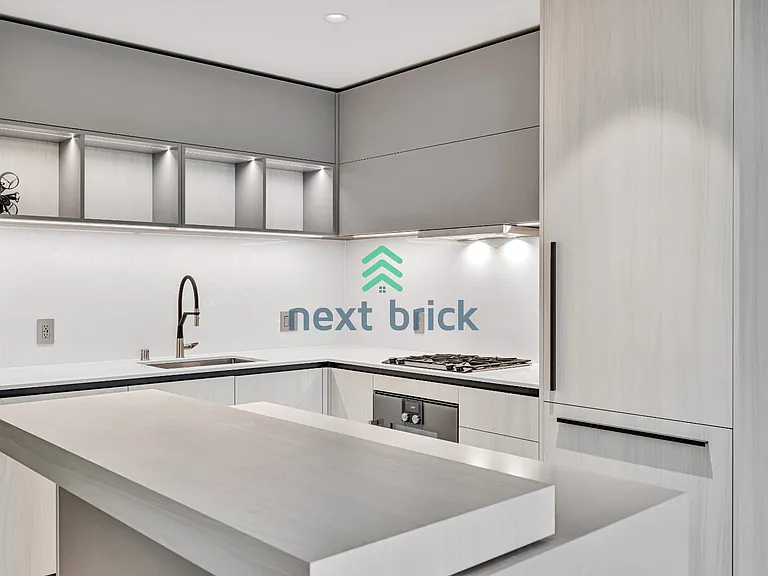 889 Avenue Sq NE #303 — Photo 2