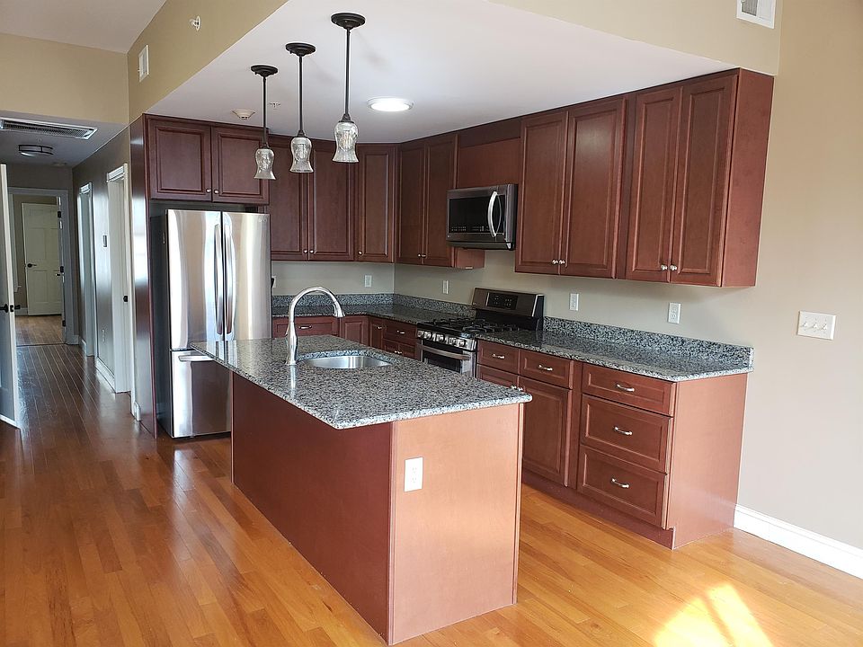 Newly remodeled kitchen with stainless appliances and dishwasher