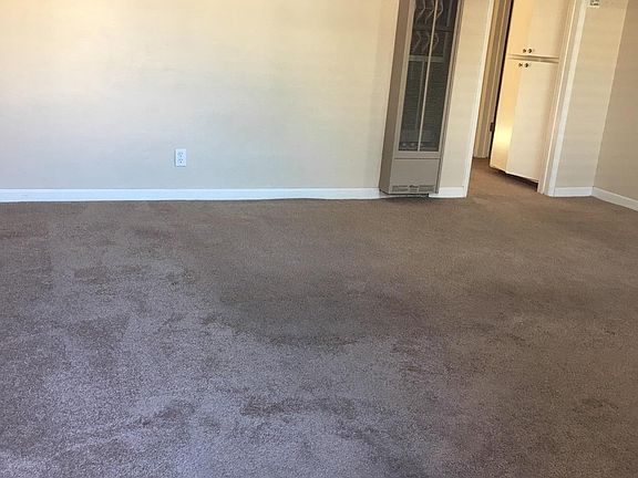 Living room leading to bedrooms and bathroom