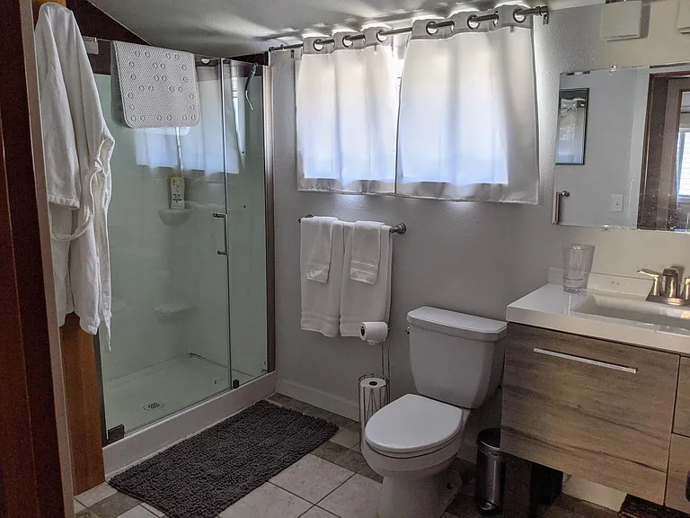 Upper Bathroom with Stacked Washer & dryer
