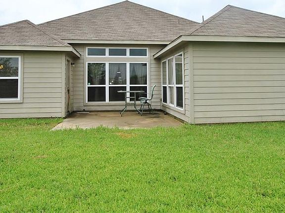 Here's the Back of the Home showing the connected patio.