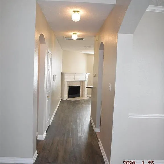 ENTRY HALL TO DEN AND KITCHEN
