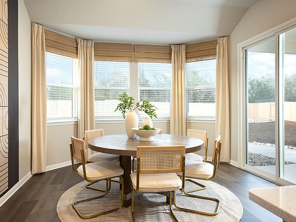 Get lots of natural light in this rounded dining room.
