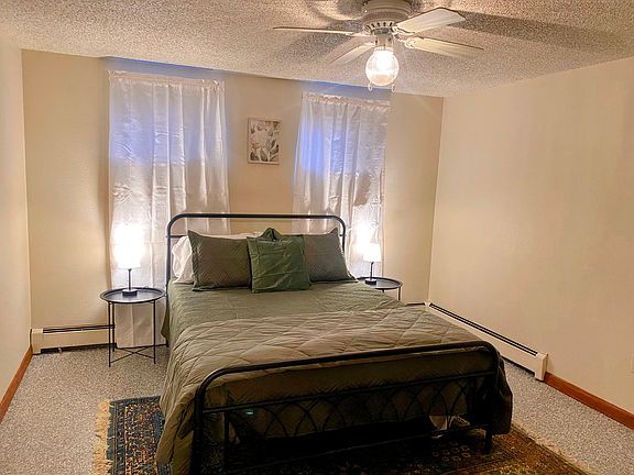 Bedroom 1 with a large TV