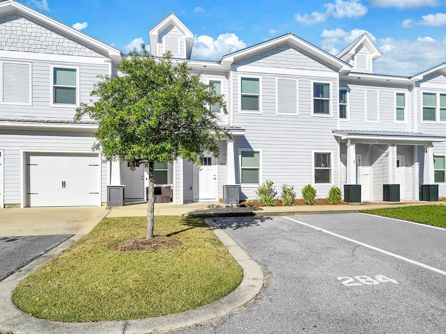 Affordable Coastal Living with Peaceful Wooded Views! — Photo 3