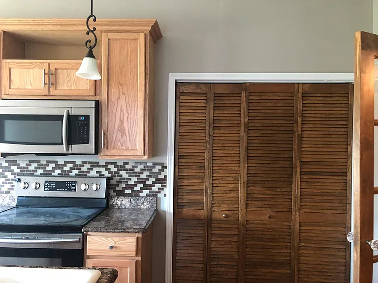 Kitchen w/ stainless steel appliances