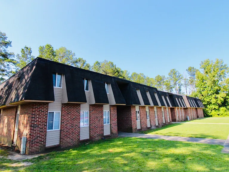 Village Apartments — Photo 8