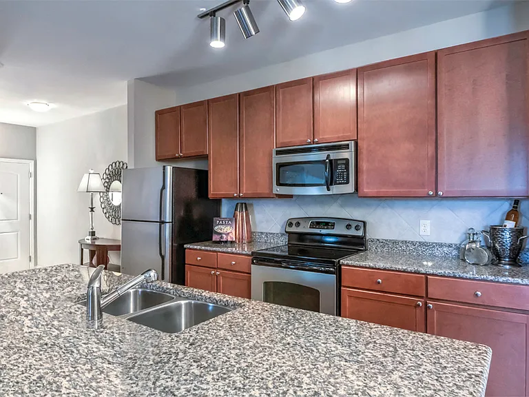 Classic apartments - open kitchens with 42" cabinetry and expansive kitchen islands available