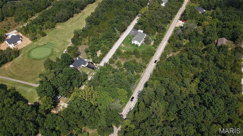 LOT 75//6045 Peach Tree Dr — Raintree Country Club
