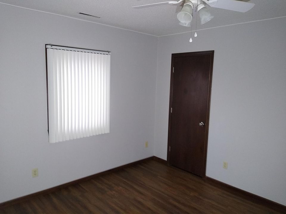 Note the contemporary vinyl floors that make cleanup a breeze. There's another large double-door closet in this 2nd bedroom.