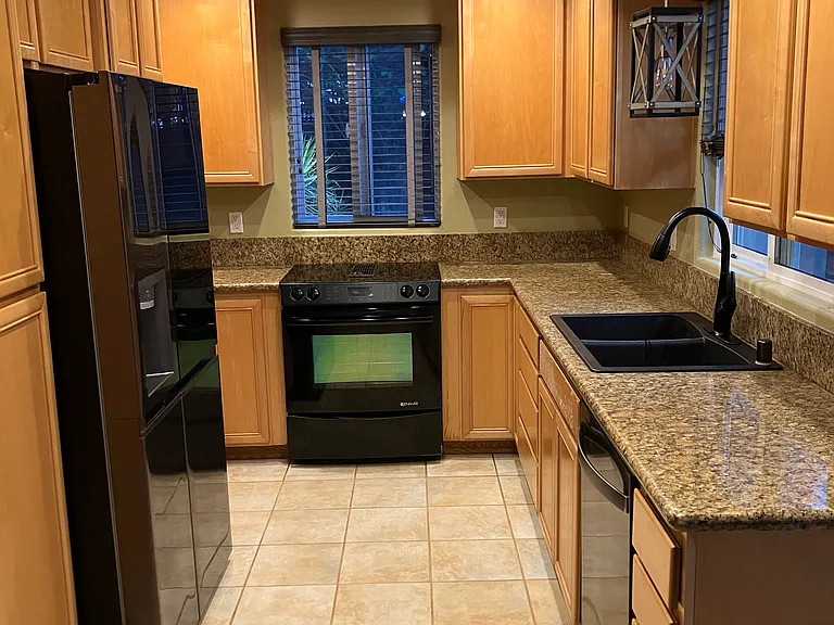Kitchen with new stainless steel appliances