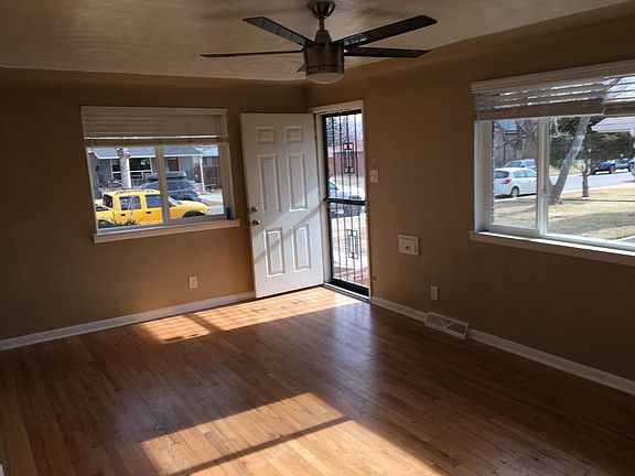 Living Room w/ new windows and hardwood floors