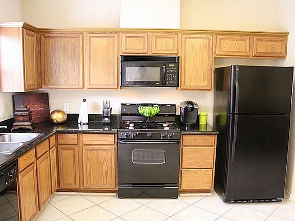Plenty of counter space and cabinet space in the kitchen