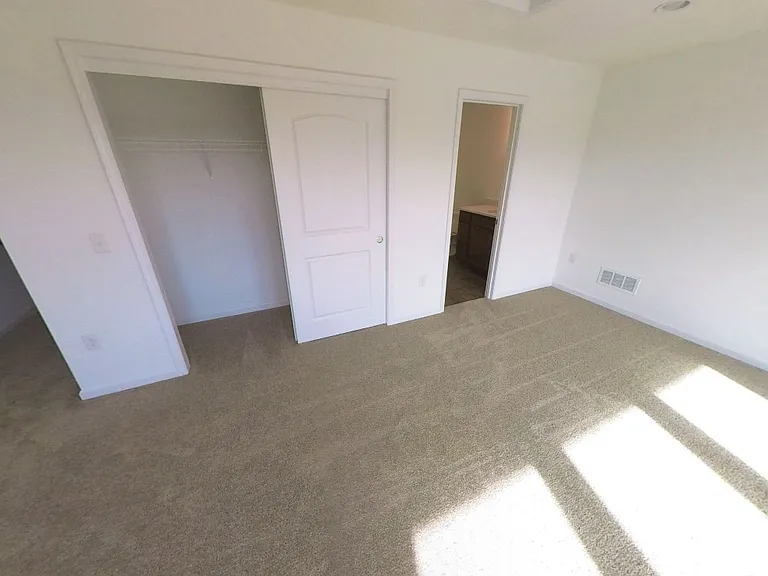 Upstairs closet + full bathroom