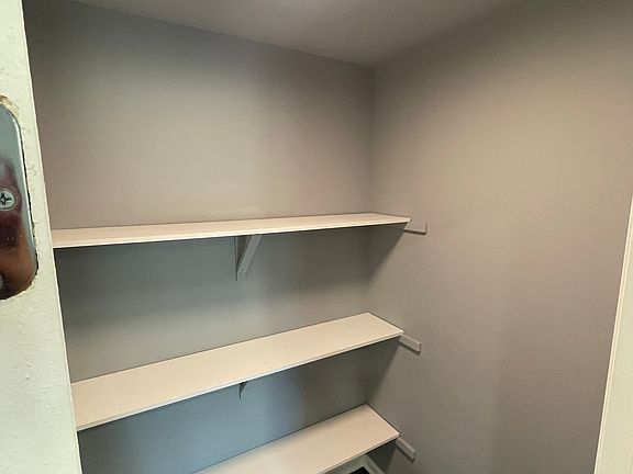 Pantry attached to kitchen