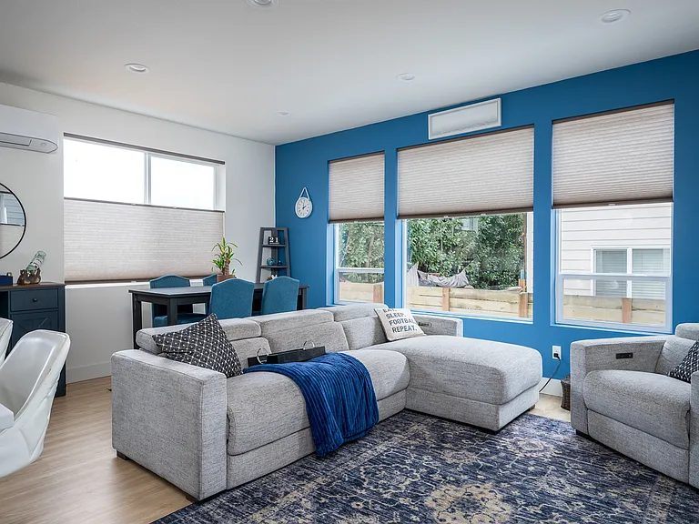 Large, living area with abundant natural light
