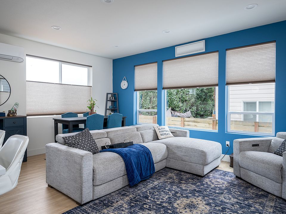 Large, living area with abundant natural light
