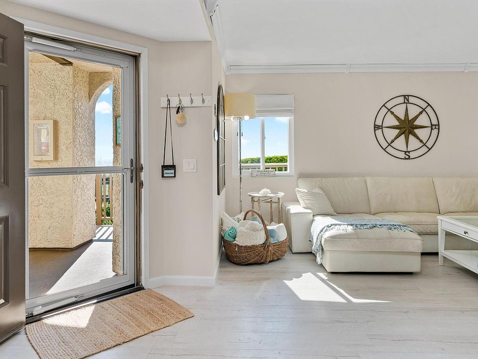 Front door, ocean view window and front porch.