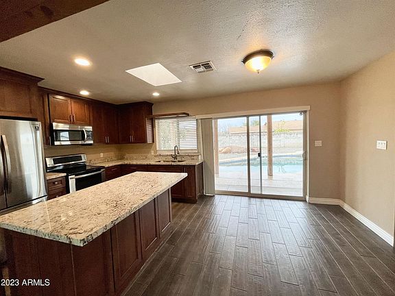 4th image of 9028 W Heatherbrae Dr