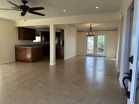 Standing at the front door. Open floor plan. Canned lights throughout the house.