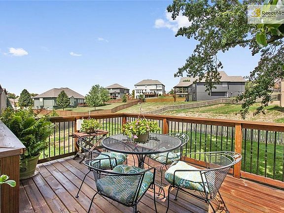 The spacious back deck leads to the professionally landscaped backyard. Plenty of room for entertaining!