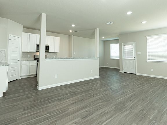 Family Room to Kitchen and Dining Area