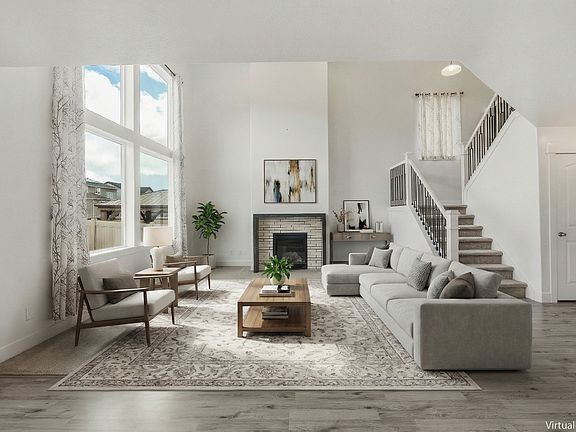 Oversized windows fill the home with abundant natural light