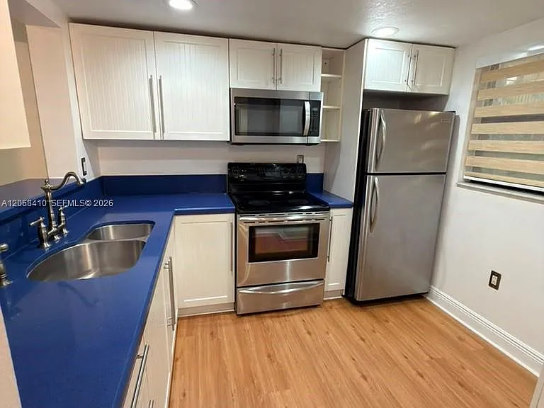 10835 SW 112th Ave #114 — Photo 1